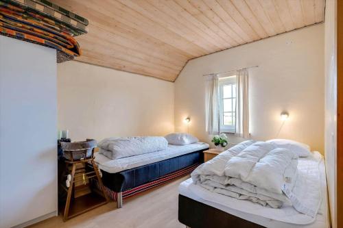 Ένα ή περισσότερα κρεβάτια σε δωμάτιο στο 377-Harboore-Fourmivej-56