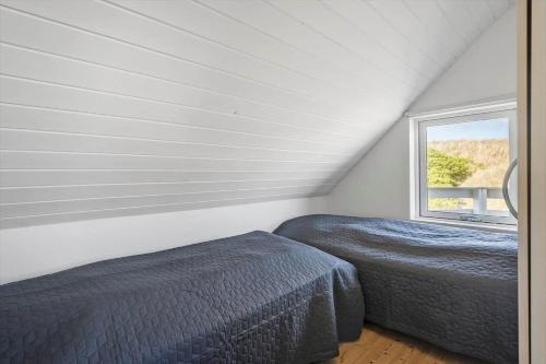 Ένα ή περισσότερα κρεβάτια σε δωμάτιο στο 389-Harboore-Fourmivej-76