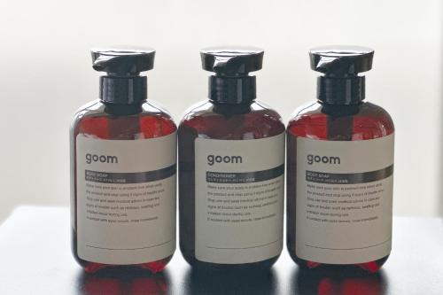 a group of three bottles of soap on a table at goom Hotel Fukuoka-Kokusai-Center in Fukuoka