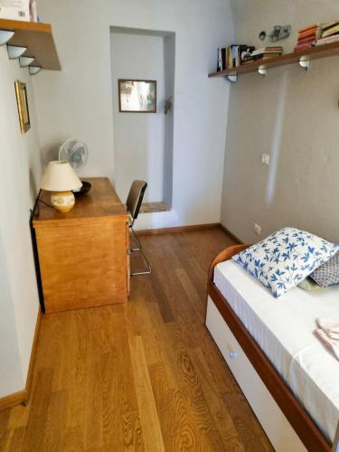 Postel nebo postele na pokoji v ubytování Dimora Le Poiane