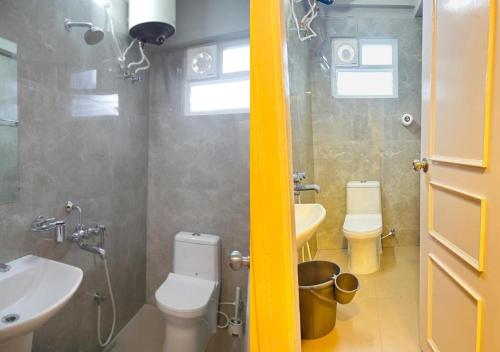 a bathroom with a sink and a toilet and a shower at Evara Luxury Living Central 3BHK near HITEC City in Hyderabad