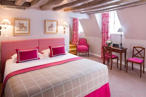 Un ou plusieurs lits dans un hébergement de l'établissement Le Relais Saint Honoré