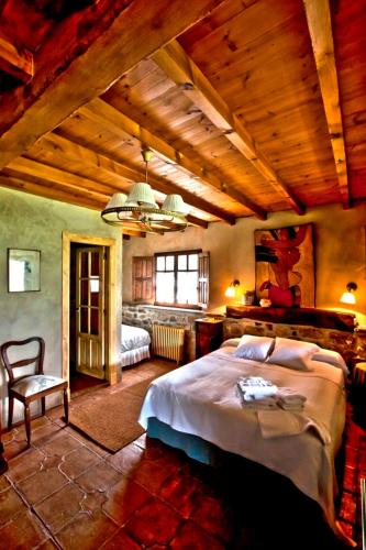 Ένα ή περισσότερα κρεβάτια σε δωμάτιο στο La Casona de Con