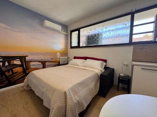Ένα ή περισσότερα κρεβάτια σε δωμάτιο στο Scirocco - Elegant Apartment