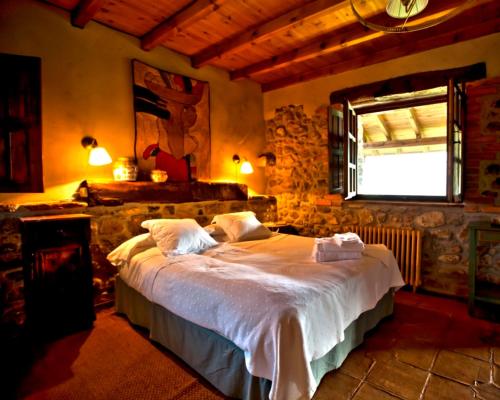 Ένα ή περισσότερα κρεβάτια σε δωμάτιο στο La Casona de Con