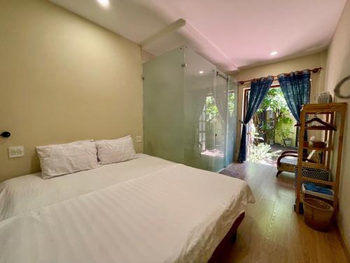 Haven Boutique Hotel Quy Nhonにあるベッド