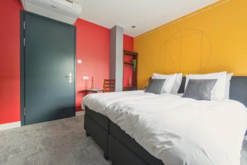 Ένα ή περισσότερα κρεβάτια σε δωμάτιο στο Stylish Grand-hotel Apartment Central