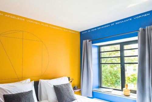 Ένα ή περισσότερα κρεβάτια σε δωμάτιο στο Stylish Grand-hotel Apartment Central