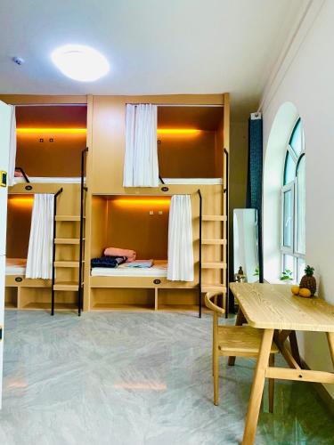 Katil atau katil-katil dalam bilik di Jingyaju Homestay