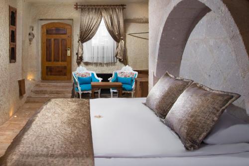 Katil atau katil-katil dalam bilik di Dionysos Cave Cappadocia Hotel