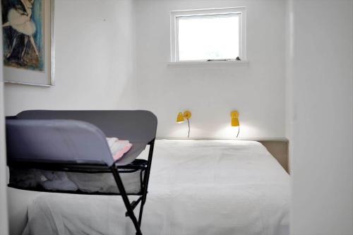Postel nebo postele na pokoji v ubytování 10034-Rorvig-Hojvaenget-2