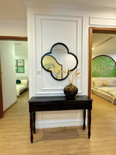 Ένα ή περισσότερα κρεβάτια σε δωμάτιο στο Dani Apartment - Vinhomes Times City - Hà Nội