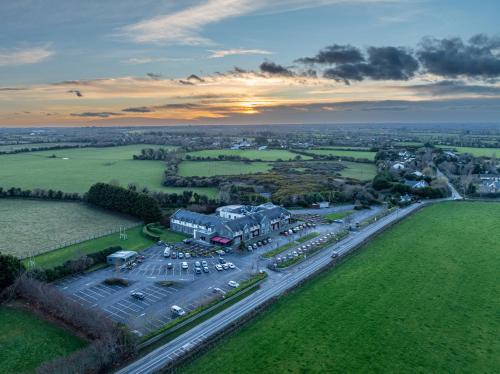an aerial view of a parking lot with cars at Kettles Country House Hotel in Swords