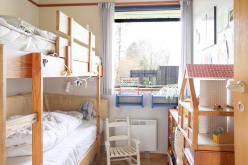 a small bedroom with bunk beds and a window at 13371-1-Vig-Tjornedalen-3 in Vig