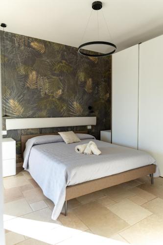Katil atau katil-katil dalam bilik di Villa Santo Spirito a 5 minuti da Otranto