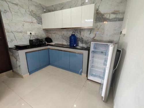 Η κουζίνα ή μικρή κουζίνα στο Nandan Elite 3bhk