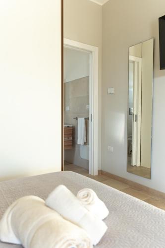 Katil atau katil-katil dalam bilik di Villa Santo Spirito a 5 minuti da Otranto