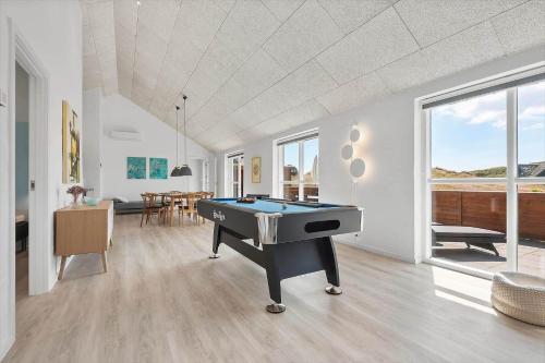 a living room with a pool table in it at FAN050-Fano-Skovsletten-2 in Fanø