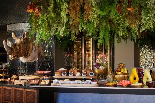 a display window of a bakery with cakes and pastries at NH Collection Ibiza in Ibiza Town