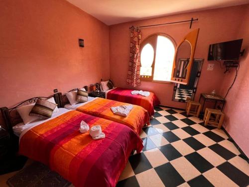 Una cama o camas en una habitación de Maison d´hôtes Amazir