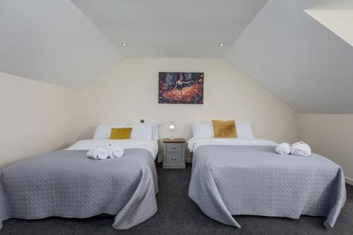 Ένα ή περισσότερα κρεβάτια σε δωμάτιο στο Spacious Luxurious Serviced Accommodation 6