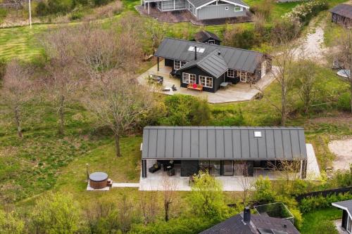an aerial view of a house with a gray roof at 8916-Allingabro-Borgmestervangen-16 in Allingåbro