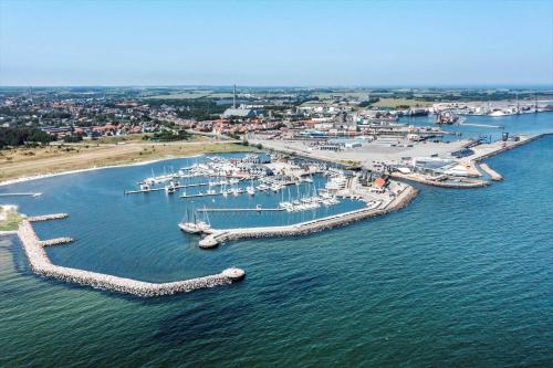 an aerial view of a marina with boats in the water at 8503-Grenaa-Ellevej-29 in Grenå