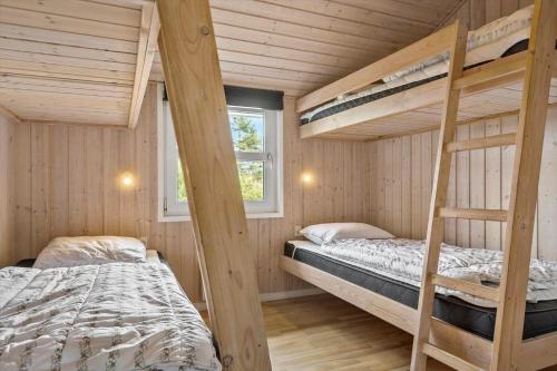 Postel nebo postele na pokoji v ubytování 8840-Glesborg-Strandskadevej-12-a