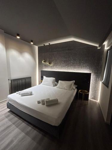 Кровать или кровати в номере Michelangelo Etna Hotel