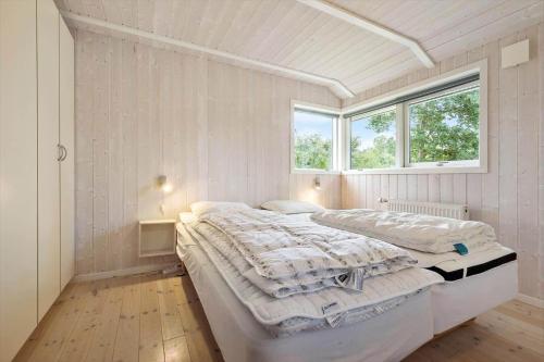 Giường trong phòng chung tại 8519-Grenaa-Nobilisvej-13