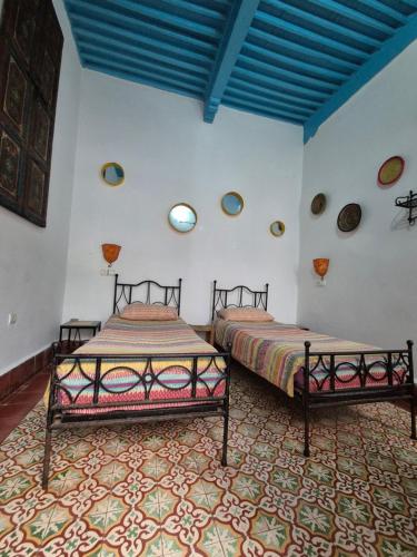 Riad Sidi Magdoulにあるベッド