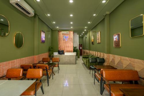 Χώρος καθιστικού στο AMILA NGUYEN HUE HOTEL by SAZI