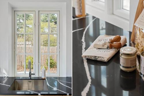 a kitchen counter with a sink and a window at 1539-Liseleje-Skippervej-3 in Liseleje