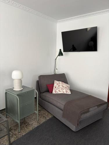 TV a/nebo společenská místnost v ubytování Vicedo Bay View