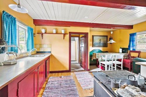 a kitchen with a sink and a stove top oven at 1102-N-Hundested-Skansevej-45 in Hundested