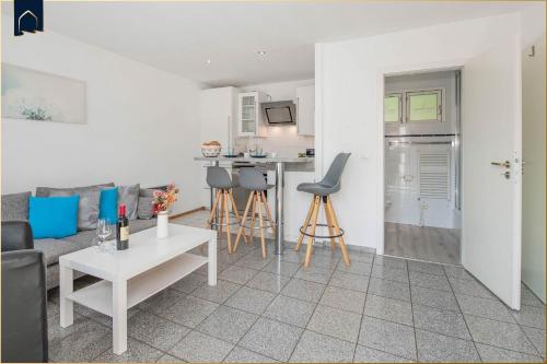 a living room with a couch and a table at Ferienanlage Bansin Seepferdchen 2 in Bansin
