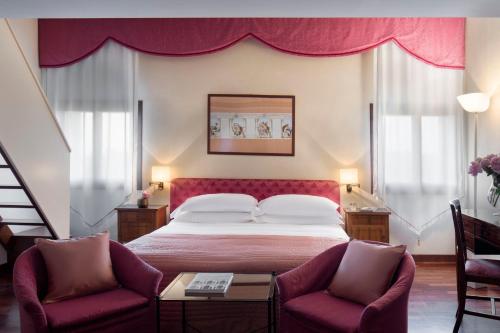 Villa Michelangelo Vicenza – Starhotels Collezioneにあるベッド