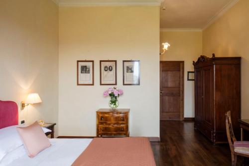 Villa Michelangelo Vicenza – Starhotels Collezioneにあるベッド