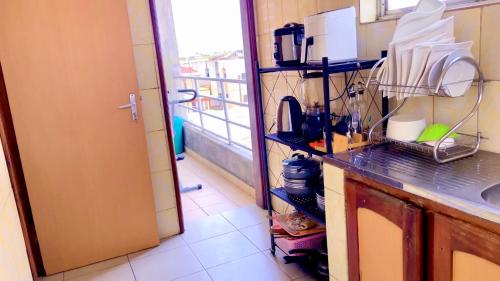 Una cocina o cocineta en Marthe Appartement