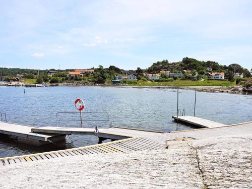 a dock in the middle of a body of water at 4 person holiday home in HENÅN-By Traum in Henån
