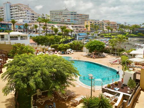 a view of a swimming pool in a resort at Le Cécilia in Puerto de Santiago