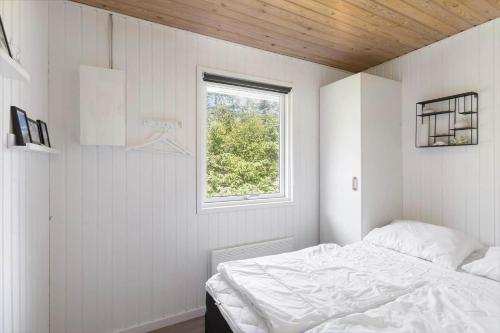 Кровать или кровати в номере BL1064-Saltum-Lille-Fiskerbanke-1