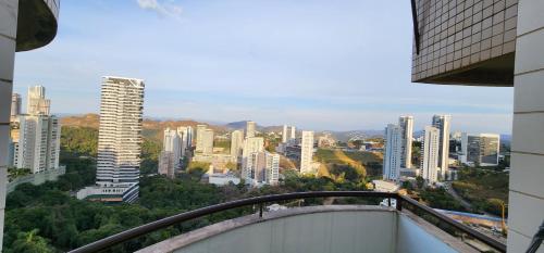 a view of a city skyline with tall buildings at Tranquilidade e Vista Panorâmica - Nova Lima in Nova Lima