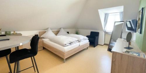 Ferienappartements inTOuRにあるベッド