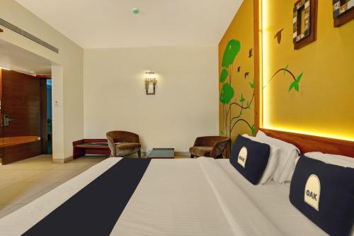 a hotel room with a bed in a room at Astra Hotels & Suites - Marathalli in Bengaluru