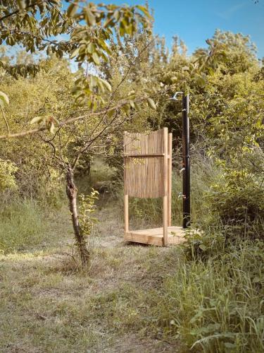 a wooden door in the middle of a field at Jelena in Kutná Hora