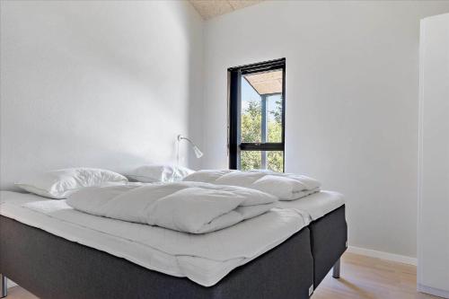 Ένα ή περισσότερα κρεβάτια σε δωμάτιο στο BL1650-Saltum-Tolhoj-19