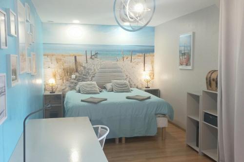 Ένα ή περισσότερα κρεβάτια σε δωμάτιο στο Évasion entre Seine et forêt