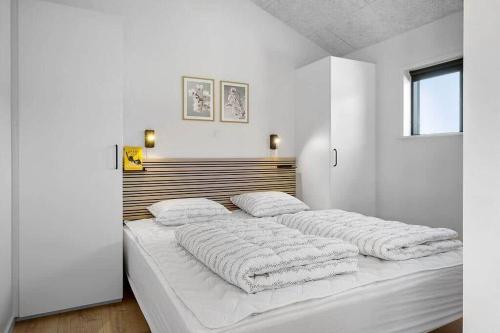 Voodi või voodid majutusasutuse BL1257-Saltum-Vesterhavs-Sletten-35 toas