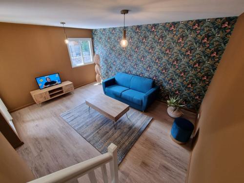 Posezení v ubytování La Parenthèse exotique, duplex cosy à deux pas du lagon